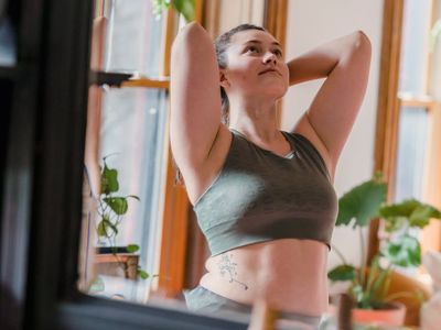 A small green plant in the yoga room.